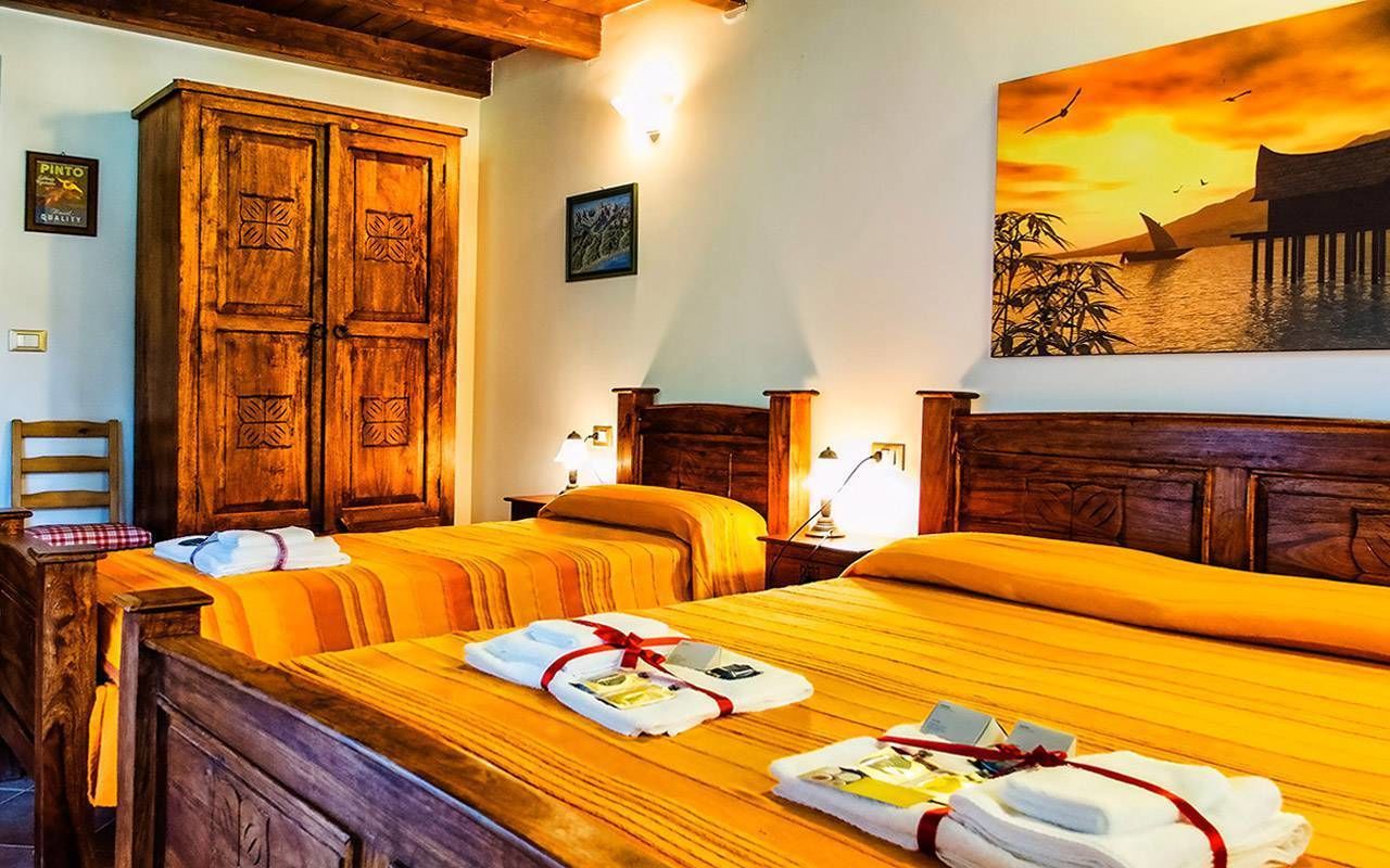 Quadruple Room, Kitchenette (Profumo del Mattino) | Laptop workspace, free WiFi, bed sheets