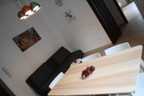 Deluxe Apartment, 1 Bedroom, Balcony, City View | Living area | Flat-screen TV - Casa Mia - NO Reception (Trento)