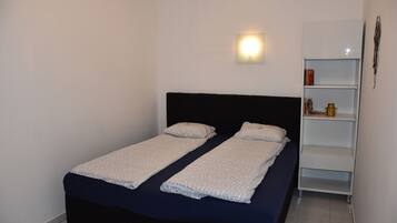 1 Schlafzimmer, Bügeleisen/Bügelbrett, kostenloses WLAN, Bettwäsche