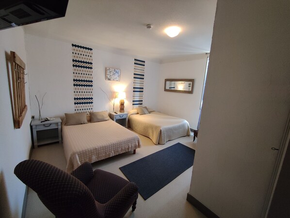 Chambre triple | Décor unique, ameublement unique, lit d’appoint (supplément)