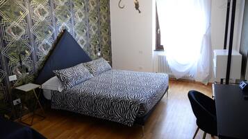 Desk, laptop workspace, blackout curtains, free WiFi