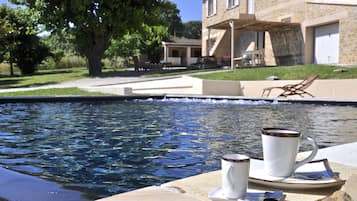 Outdoor pool, sun loungers