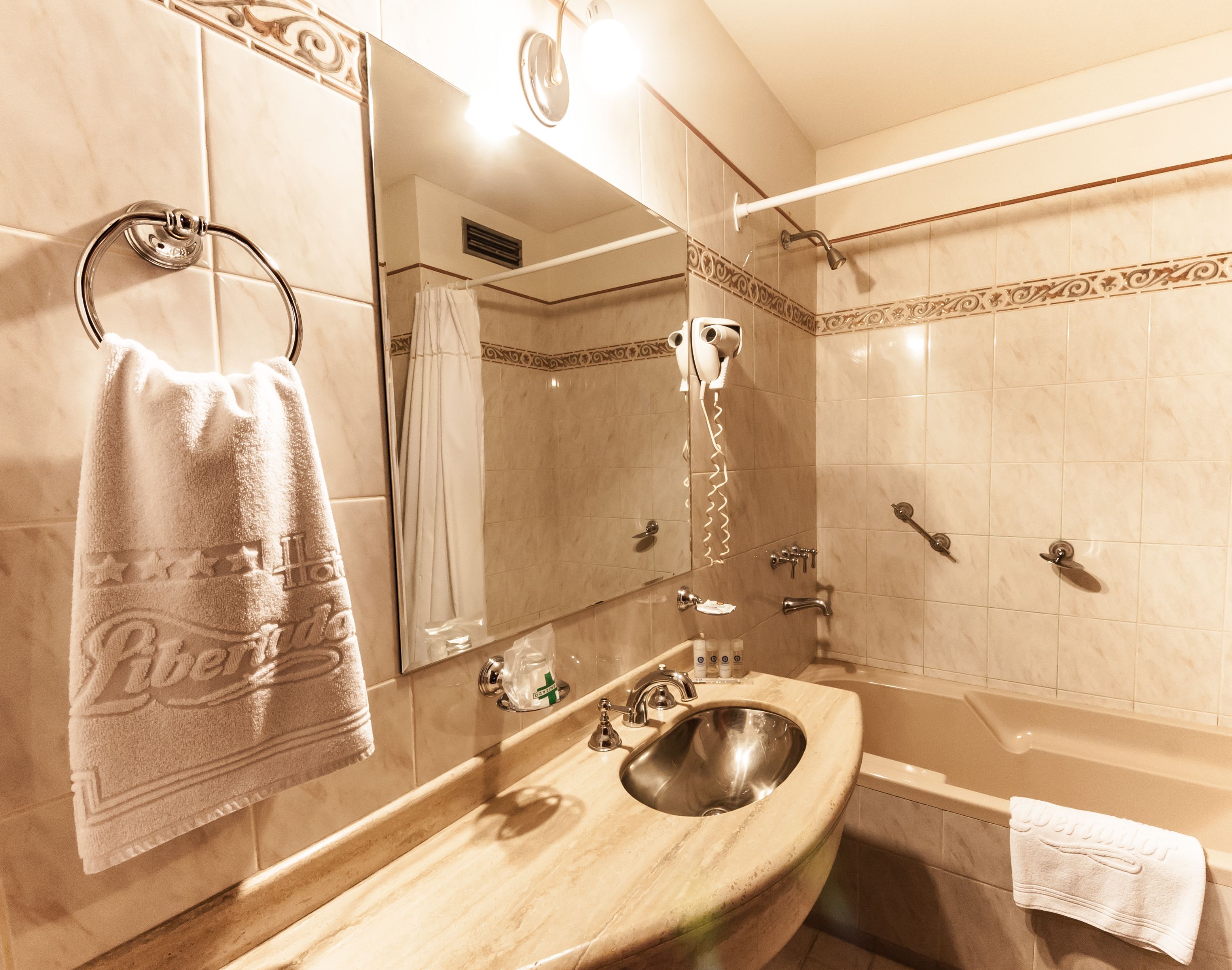 combined shower/bathtub, deep-soaking bathtub, rainfall showerhead