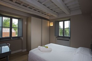 Premium bedding, down duvets, memory-foam beds, desk