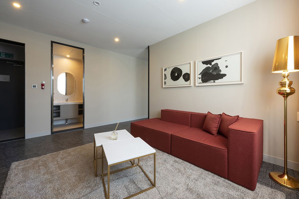 suite | living area | 65-inch led tv with cable channels, tv, computer