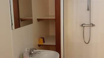 Shower, free toiletries, hair dryer, towels