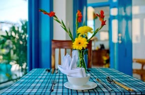 Breakfast, lunch, dinner served; local cuisine