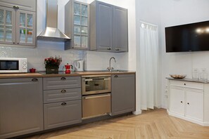 Appartamento, 2 camere da letto | Cucina privata | Frigorifero con congelatore, microonde, forno, piano cottura