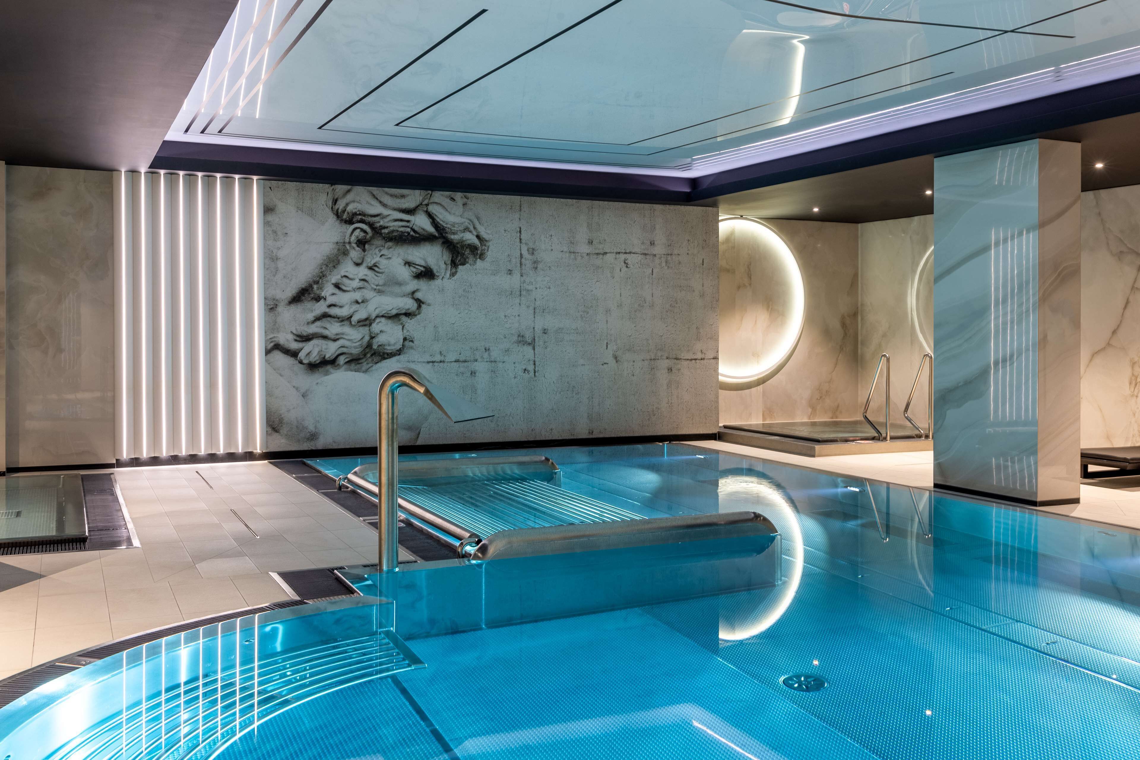 indoor pool, open 10:00 am to 9:00 pm, pool loungers