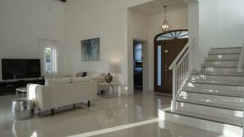 House, Multiple Beds - 3 Bedrooms | Living room | Flat-screen TV