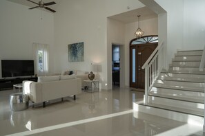 House, Multiple Beds - 3 Bedrooms | Living room | Flat-screen TV