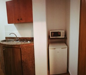 Suite Prestigio, 1 cama Queen size | Cocineta privada | Refrigerador, microondas, parrilla de estufa y tetera eléctrica