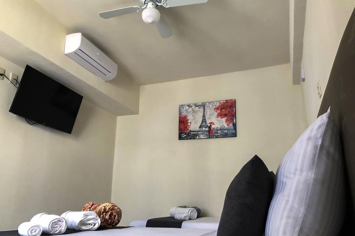 Grand Triple Room | 1 bedroom, premium bedding, down comforters, pillowtop beds