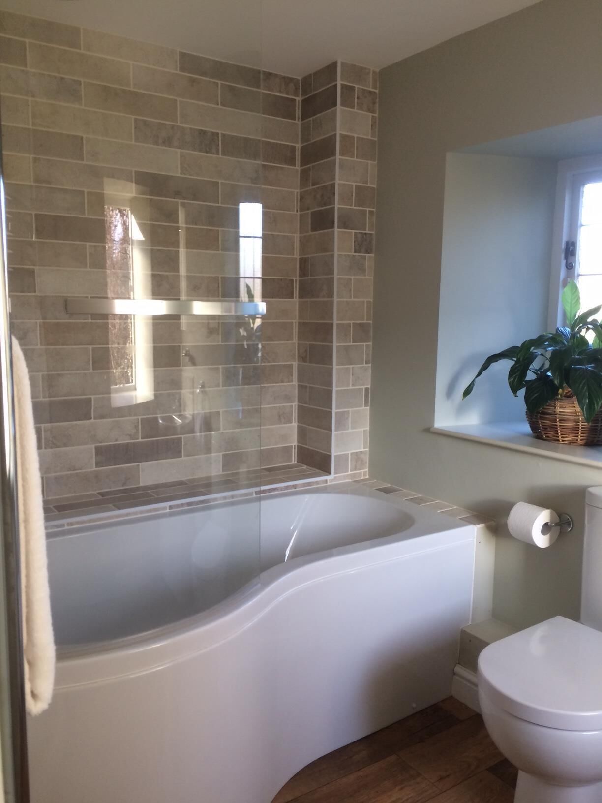 Combined shower/bathtub, hair dryer, towels, soap