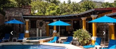 Outdoor pool, open 9:00 AM to 9:00 PM, free cabanas, pool umbrellas