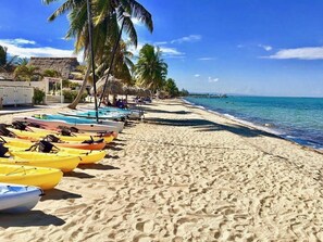 On the beach, sun-loungers, beach towels