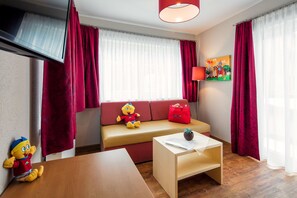 Suite (Kunibert) | Living area | TV