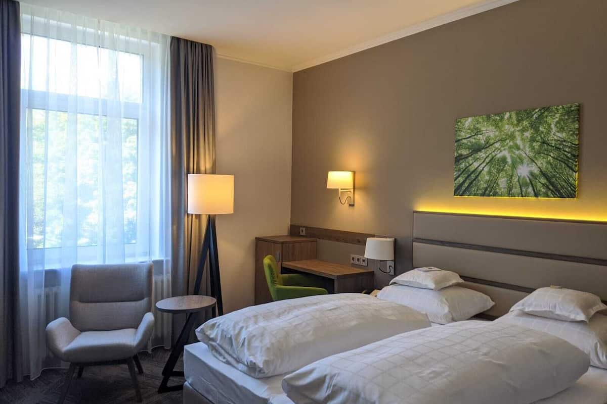 hypo-allergenic bedding, desk, free wifi, bed sheets