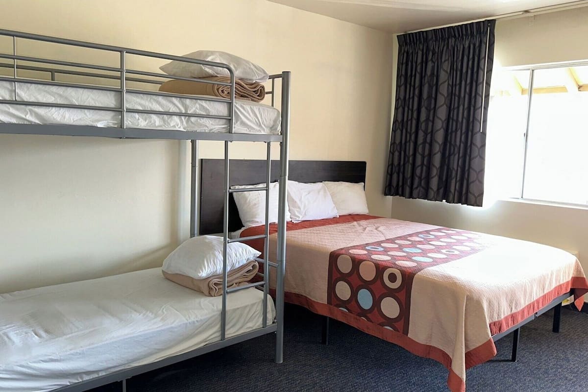 Desk, blackout drapes, iron/ironing board, WiFi (free)