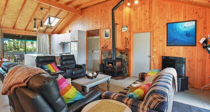 Beach House-5 minutes to beach, with deck surrounding house, family friendly