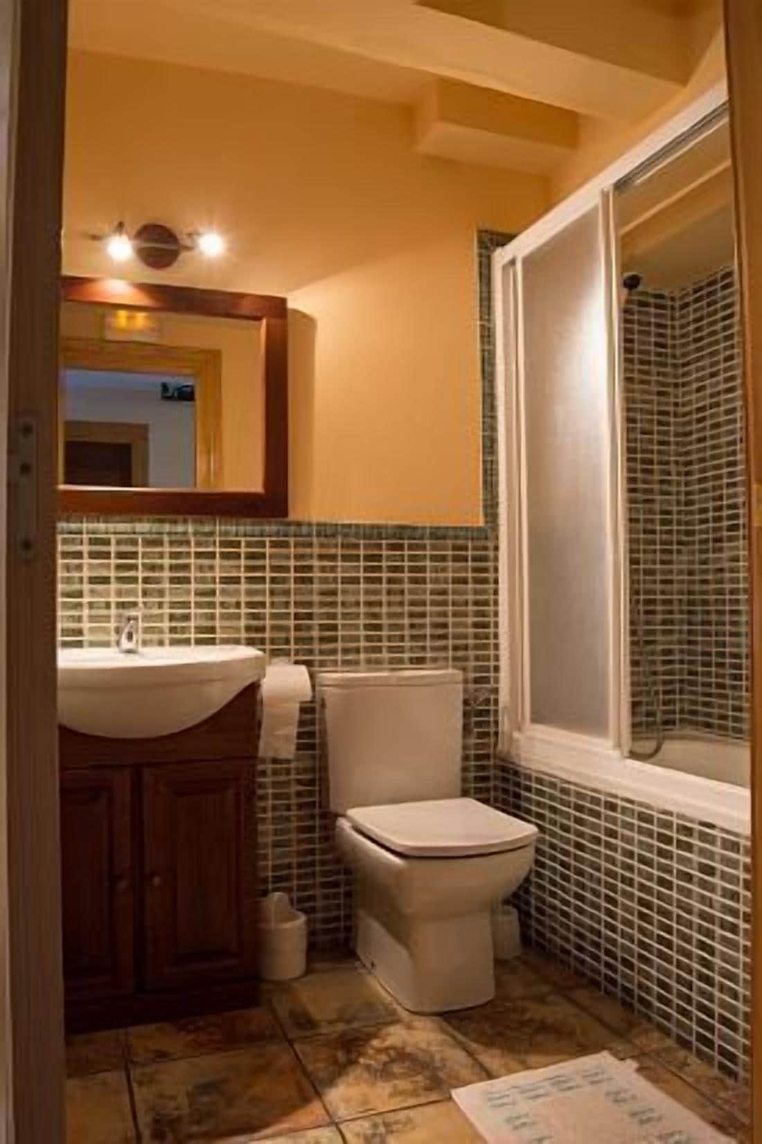Combined shower/tub, hair dryer, towels, soap