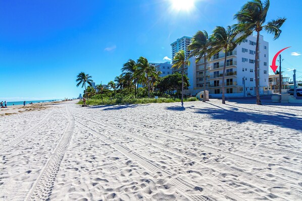 On the beach, sun-loungers, beach towels