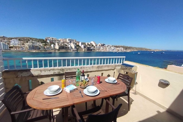 seafront terrace with bbq