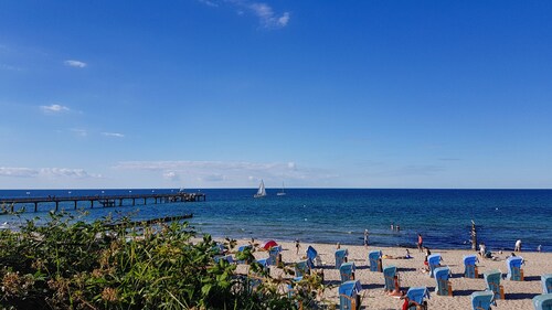 Appartement ensoleillé, proche de la plage <100m, avec balcon orienté sud, ascenseur, parking souterrain et WiFi