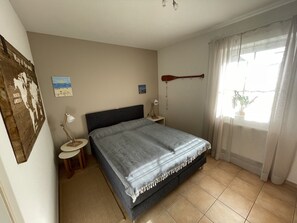 2 bedrooms, in-room safe, iron/ironing board, travel cot