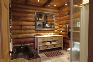 Bathtub, hair dryer, towels, soap