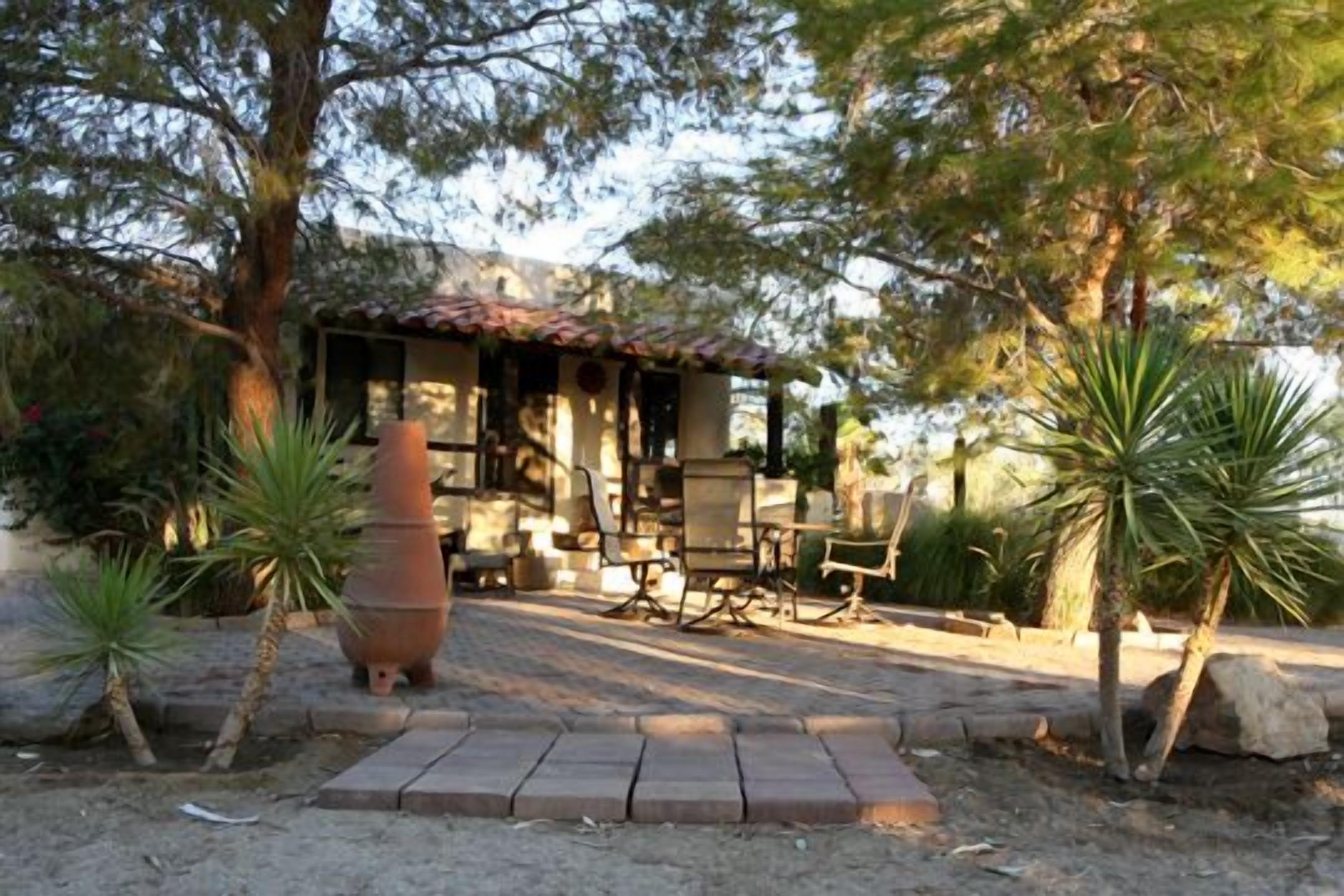 On private horse ranch, dogs welcome.   