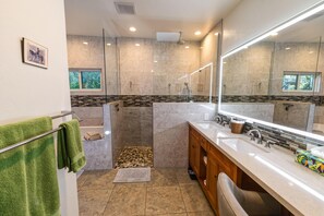 Bathtub, hair dryer, towels, soap