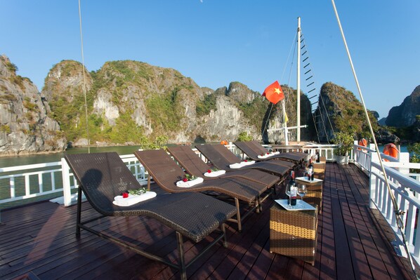 Superior Triple Room | Minibar, in-room safe, desk, blackout curtains