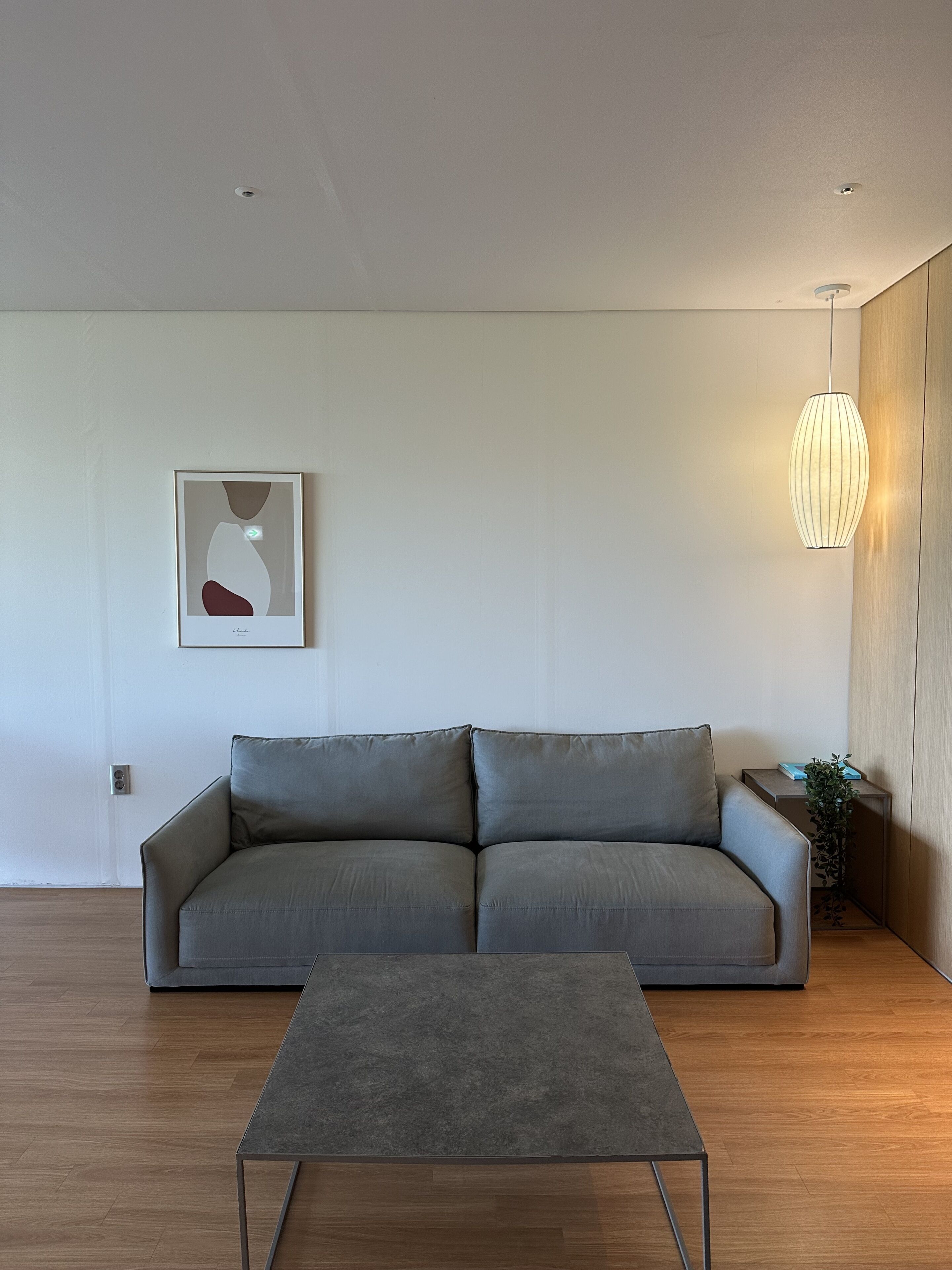 private poll villa | living area | flat-screen tv, heated floors