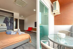 Deluxe Suite, 1 King Bed, Non Smoking | Living area | TV - Art Residence Chaweng Beach (Koh Samui)
