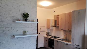 Apartment, 1 Schlafzimmer | Eigene Küche | Großer Kühlschrank, Ofen, Herdplatte, Geschirrspüler