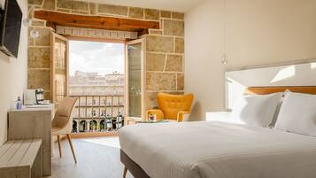 Egyptian cotton sheets, premium bedding, down duvets, minibar