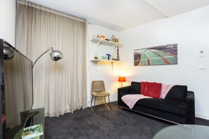 Studio | Living area | Flat-screen TV