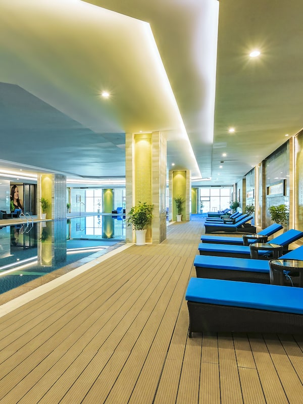 Indoor pool, open 6:00 AM to 8:00 PM, pool loungers