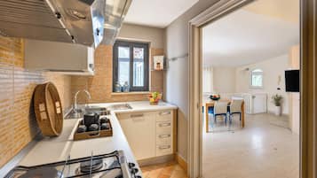 Apartment, 2 Bedrooms | Private kitchen | Full-sized fridge, microwave, oven, stovetop