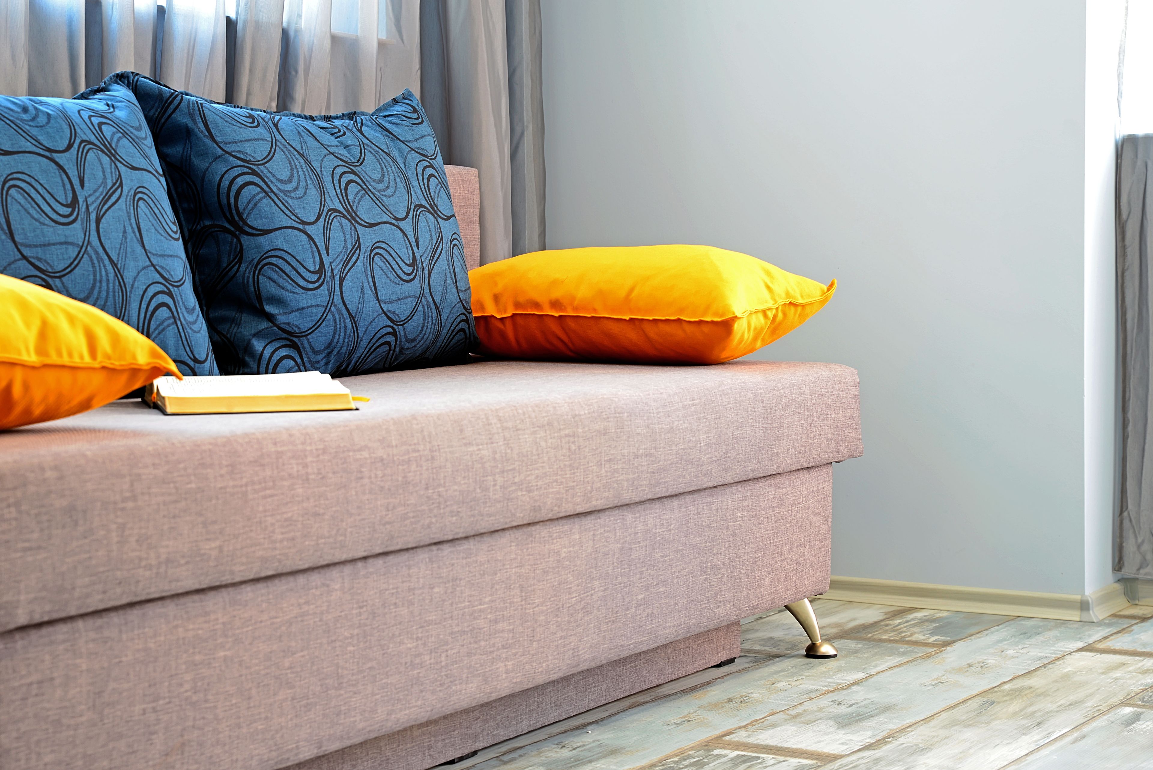 blue scene apartment | living area | flat-screen tv