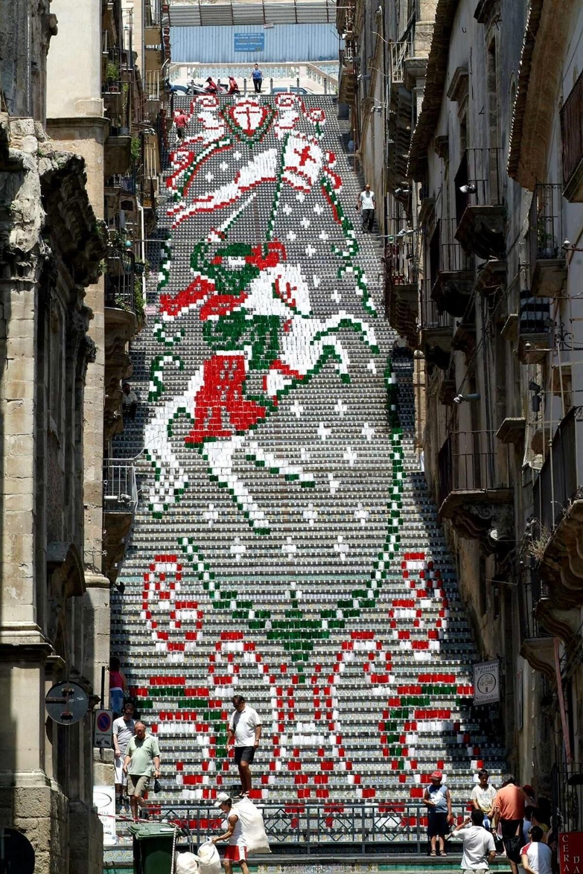A staircase with a large, colorful mosaic pattern.