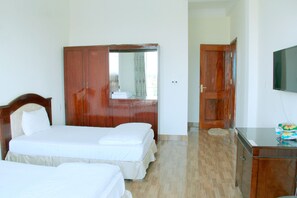 Double Room | Living area | Flat-screen TV