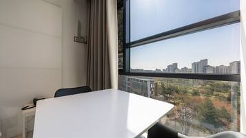 Premier Double | Premium bedding, desk, blackout drapes, soundproofing