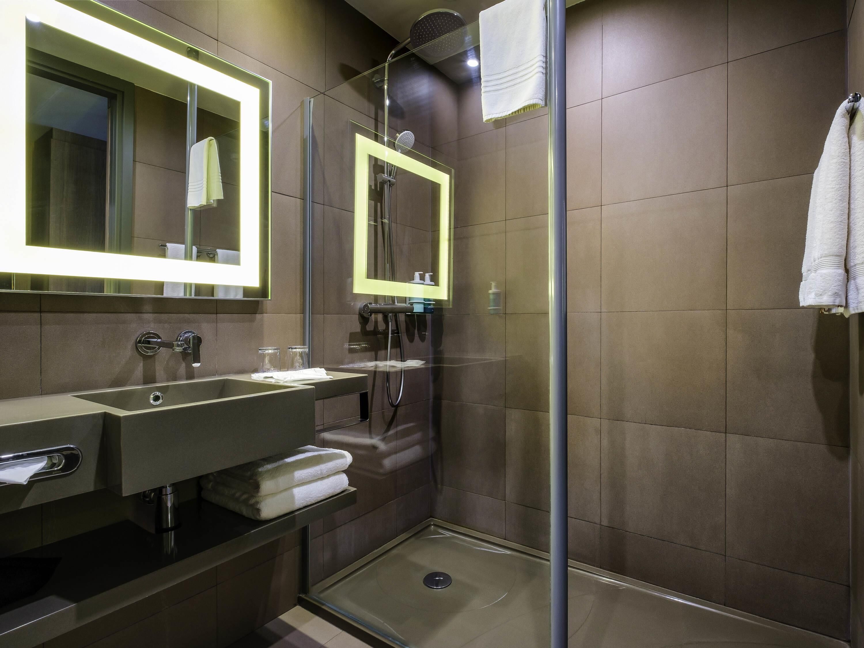 Eco-friendly toiletries, hair dryer, bathrobes, slippers