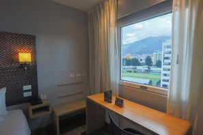 Standard Room, 2 Twin Beds | In-room safe, laptop workspace, blackout drapes, soundproofing