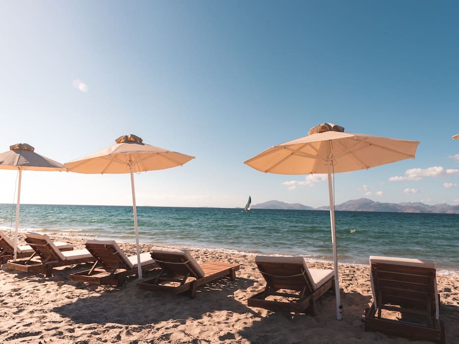 Private beach nearby, white sand, sun loungers, beach umbrellas