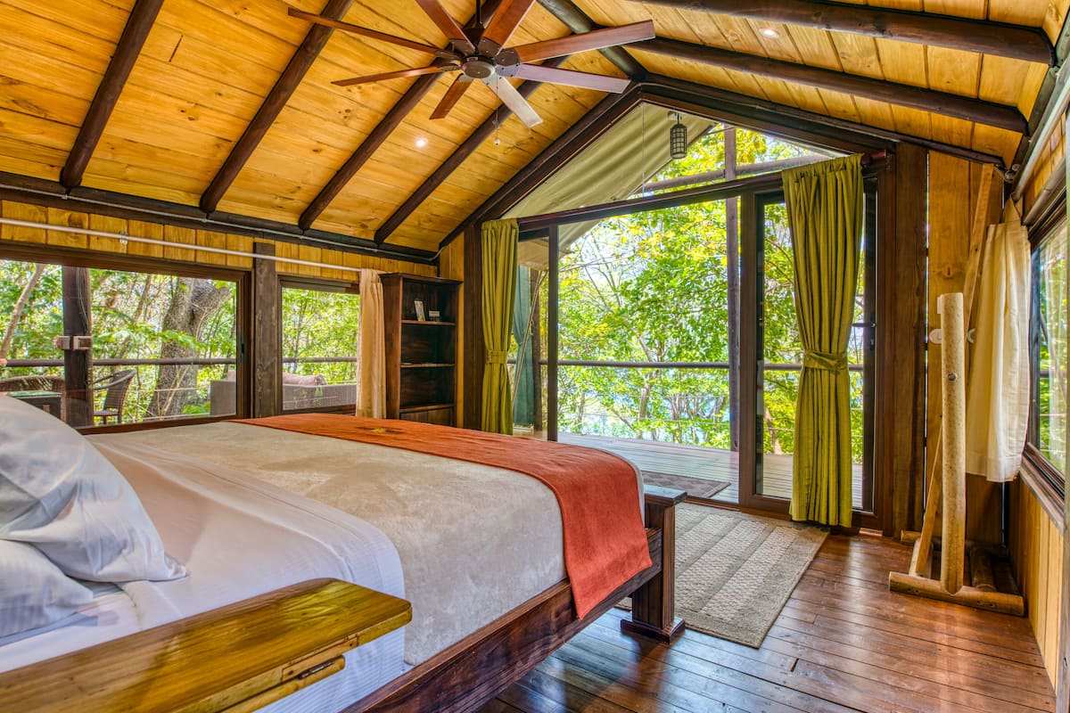 honeymoon loft, 1 king bed, garden view, garden area | 1 bedroom, in-room safe, free wifi, bed sheets