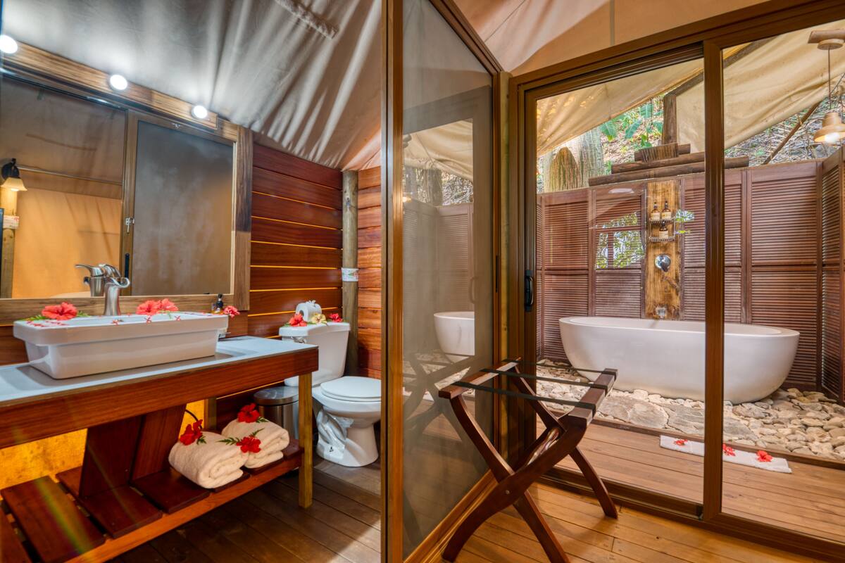 honeymoon loft, 1 king bed, garden view, garden area | bathroom | shower, free toiletries, towels