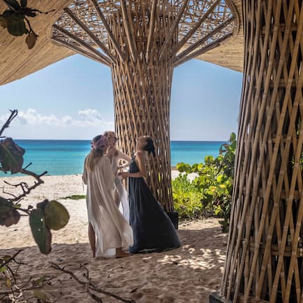 On the beach, white sand, free beach cabanas, sun loungers